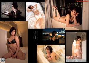 A woman in a black bikini laying in a bathtub.