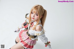 A woman in a sailor outfit is posing for a picture.